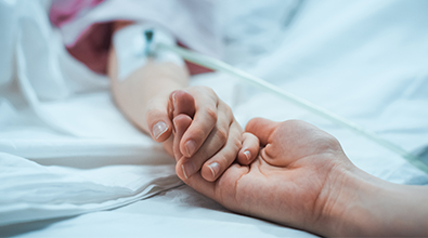 Holding the Hand of a Patient